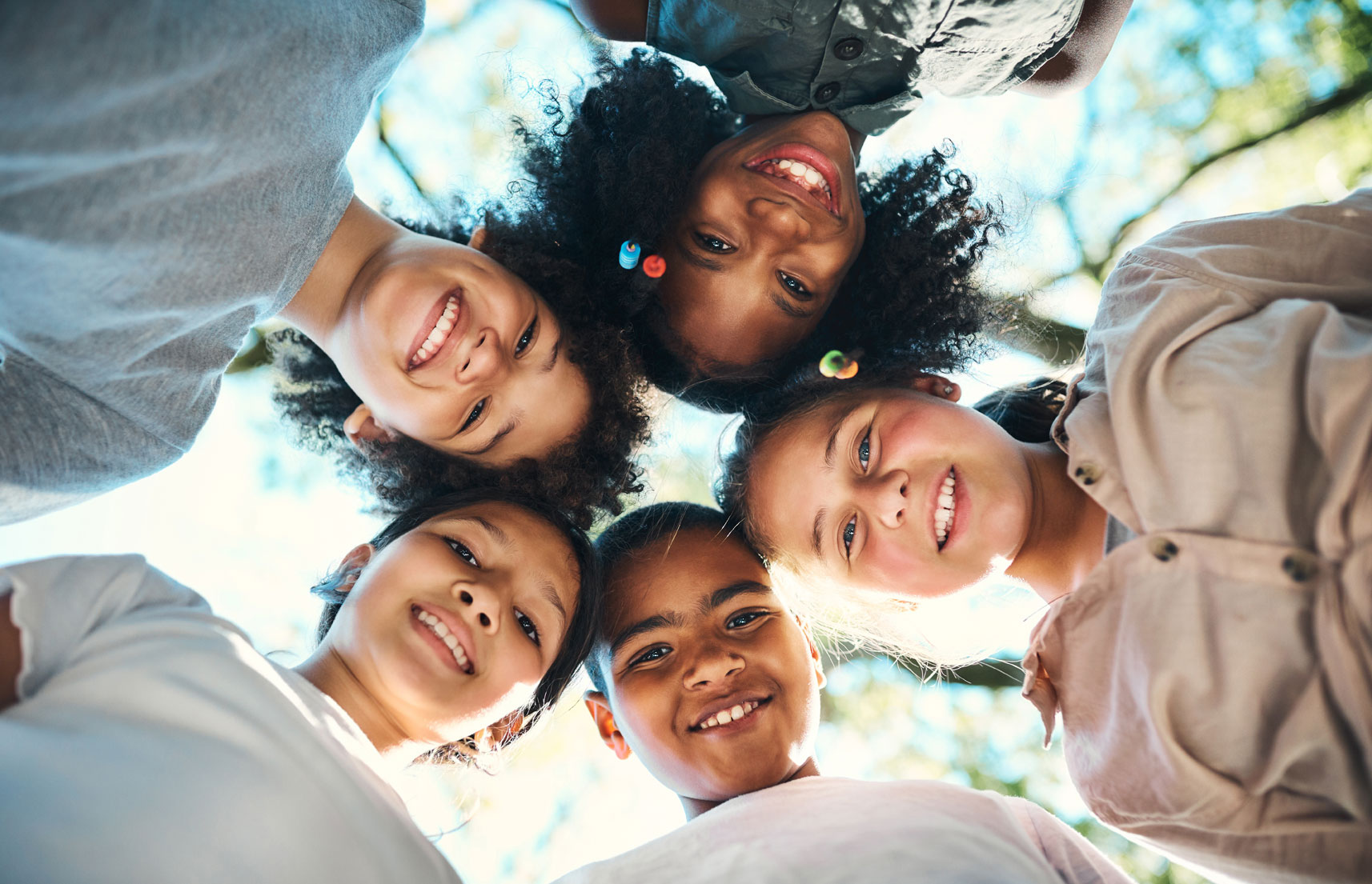 feature-shot-of-a-group-of-teenagers-standing-in-a-circle